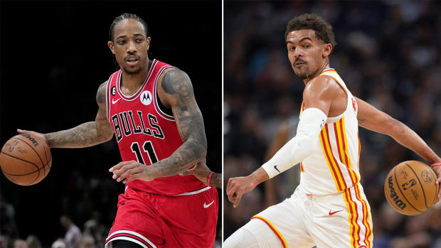Bulls forward DeMar DeRozan and Hawks guard Trae Young.